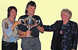 Karin and Bernhard Hausberger receive their prizes from Val Ellis.