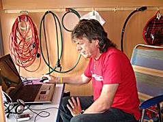 Bernhard Hausberger editing in his mobile home.