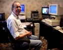 Malcolm Whiteley at his computer.