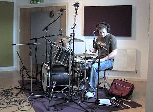 Photo of the drummer at the recording session.