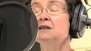 Sue Gillmurray singing.